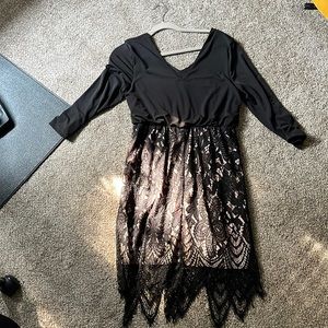Black dress, lace on bottom with nude liner. Size large.